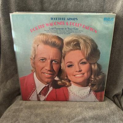 Sale Photo Thumbnail #197: "Together Always", the eighth collaborative studio album by country music legends Porter Wagoner and Dolly Parton. 
Here's more information about the album:
Release Details: It was released on September 11, 1972, by RCA Victor and produced by Bob Ferguson