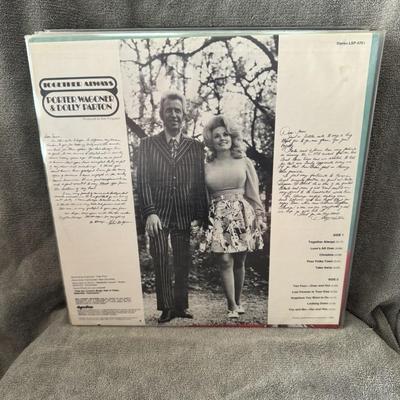 Sale Photo Thumbnail #198: "Together Always", the eighth collaborative studio album by country music legends Porter Wagoner and Dolly Parton. 
Here's more information about the album:
Release Details: It was released on September 11, 1972, by RCA Victor and produced by Bob Ferguson