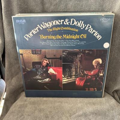 Sale Photo Thumbnail #199: "The Right Combination / Burning the Midnight Oil" by Porter Wagoner and Dolly Parton. 
Here is information about the album:
Artists: Porter Wagoner & Dolly Parton
Release Date: January 3, 1972
Genre: Country Music
Label: RCA Victor
Album Type: This is th