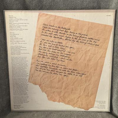 Sale Photo Thumbnail #208: "The Battle" by George Jones. 
Key facts about the album include:
Release and Label: Released in 1976 by Epic Records.
Genre: Country music.
Context: Recorded during George Jones' divorce from Tammy Wynette, the album's title is significant.
Notable Track