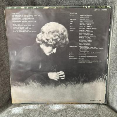 Sale Photo Thumbnail #274: "The Rainbow in Daddy's Eyes" by Sammi Smith. 
Here's some information about the album:
Artist: Sammi Smith, a prominent figure in the 1970s "outlaw country" scene and known for her soulful country vocals.
Release Date: The album was initially released in