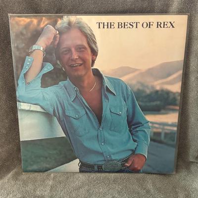 Sale Photo Thumbnail #331: "The Best of Rex" by Rex Allen Jr.. 
Here are some details about this album and artist:
Artist: Rex Allen Jr., son of the famous "Arizona Cowboy," Rex Allen Sr..
Album Title: The Best of Rex.
Label and Release: It was released on Warner Brothers Records i