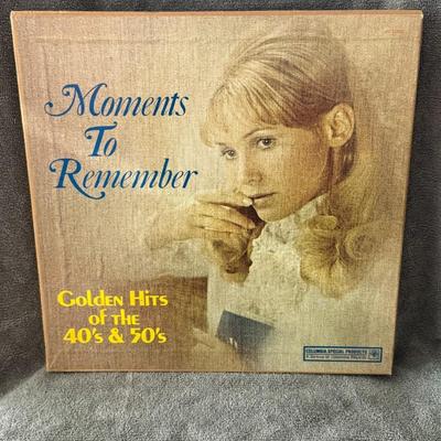 Sale Photo Thumbnail #409: "Moments To Remember Golden Hits Of The 40's & 50's". 
Here's more information about this product:
Format: It is an 8x vinyl LP box set featuring a collection of classic songs from the 1940s and 1950s.
Label: It was released by Columbia Special Products, 