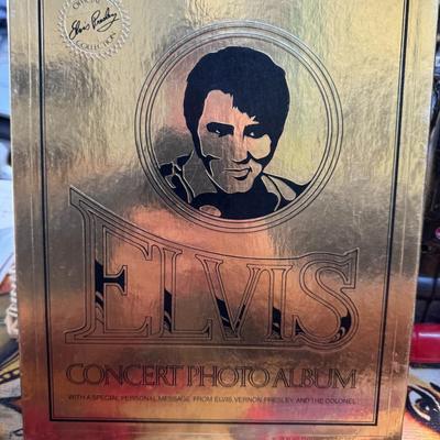 Sale Photo Thumbnail #434: Official Elvis Presley Collection Concert Photo Album from 1977, created by Boxcar Enterprises. 
Here's more information about this item:
Content: This photo album features full-page color photographs of Elvis Presley in concert, along with Elvis/RCA adve