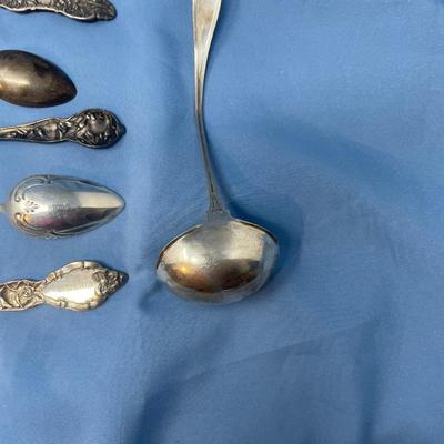 Lot 253 Assorted floral motif Sterling silver spoons & ladle