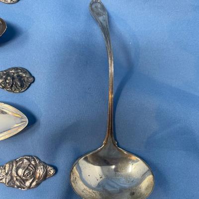 Lot 253 Assorted floral motif Sterling silver spoons & ladle