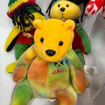Sale Photo Thumbnail #273: Many different styles, including a Panda Bear, Rastafarian Bear, and a Rainbow colored bear. See photos for what's included.