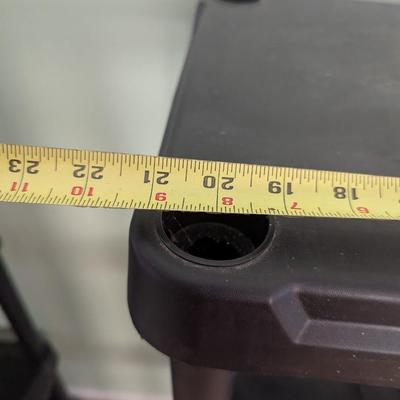 Two four-tier plastic shelves