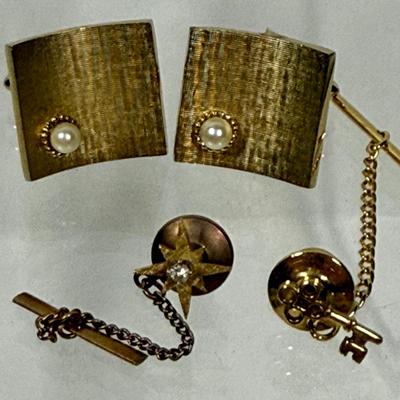 Sale Photo Thumbnail #262: Cufflinks have a pearl on each one, tie pins are a gold-tone key and a gold tone starburst.