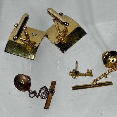Sale Photo Thumbnail #261: Cufflinks have a pearl on each one, tie pins are a gold-tone key and a gold tone starburst.