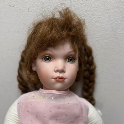Sale Photo Thumbnail #112: In fair condition with messy hair and slightly dirty clothes.