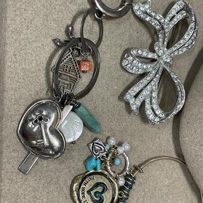 Large bow brooch, floral necklace, bracelet and key chain
