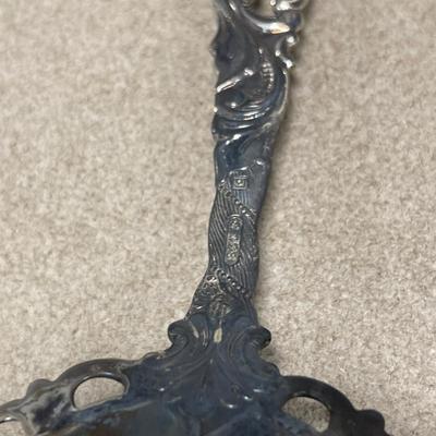 Sterling knife handle, 830 serving spoon and three silver plate items