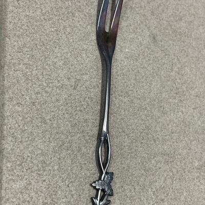 Sterling knife handle, 830 serving spoon and three silver plate items