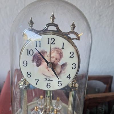 Battery operated clock with glass case