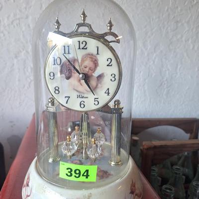 Battery operated clock with glass case