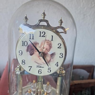 Battery operated clock with glass case