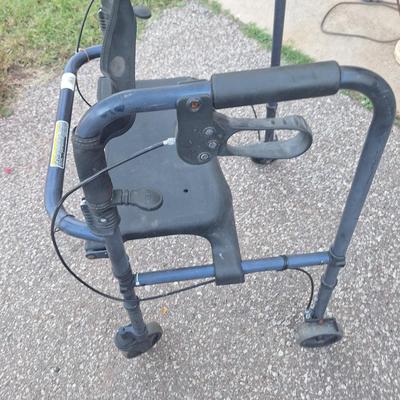 Walker with seat, wheels and brakes