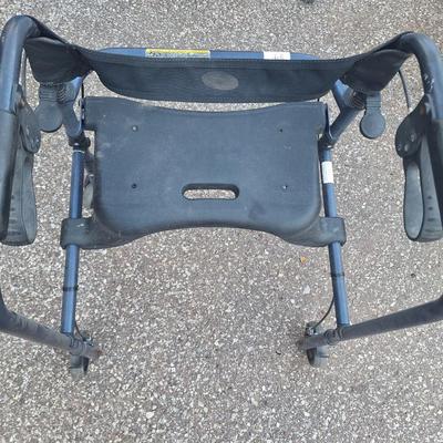 Walker with seat, wheels and brakes