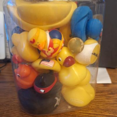 Big plastic jar of rubber ducks
