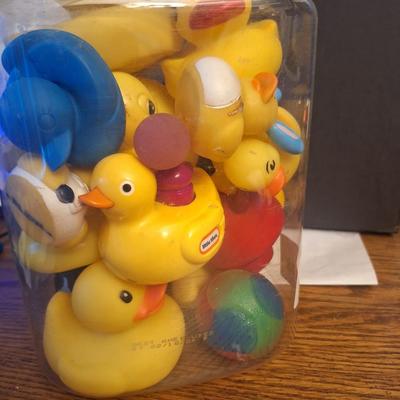 Big plastic jar of rubber ducks