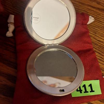 Compact mirror