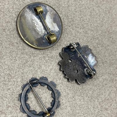 3 small blue pins; 1 is from Holland