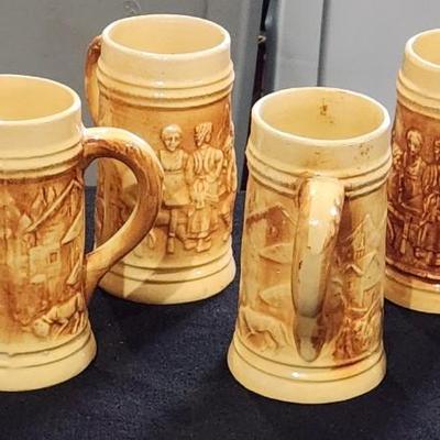 Sale Photo Thumbnail #203: Antique Vintage 1920s Hull Pottery Alpine Utility Ware Yelloware Six Steins total

Receive all items pictured as is and are in mint condition
