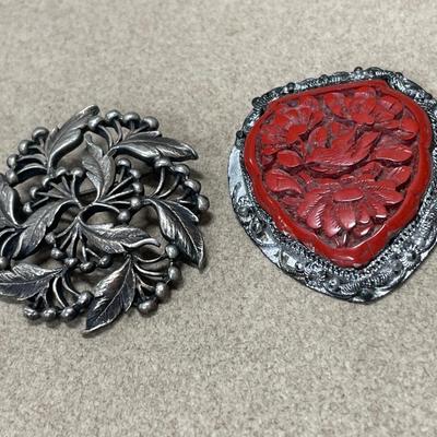2 pewter looking pins