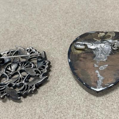2 pewter looking pins