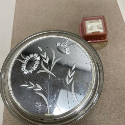 Small glass trinket box with mirror lid with earrings