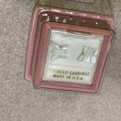 Small glass trinket box with mirror lid with earrings