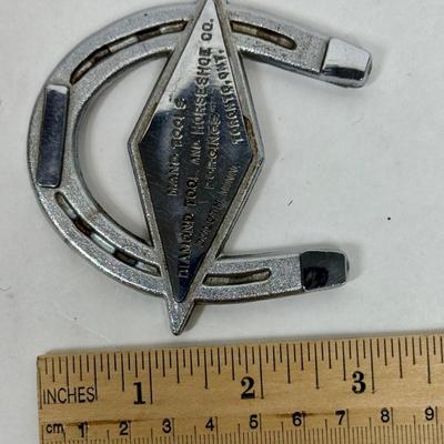 Metal Paperweight: Diamond Tool and Horseshoe Company