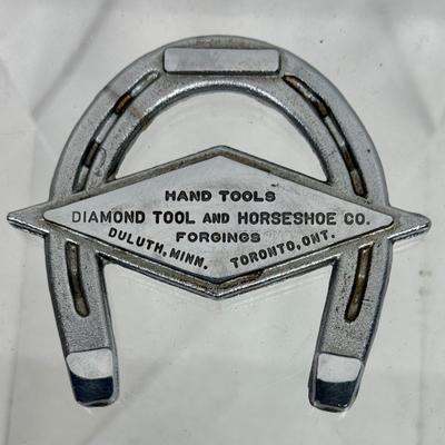 Metal Paperweight: Diamond Tool and Horseshoe Company