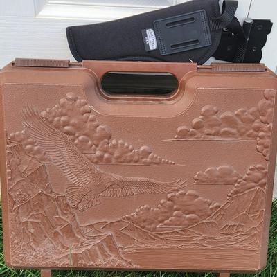 Sale Photo Thumbnail #88: Doskocil gun case and knife holder

Will receive all items pictured as is.