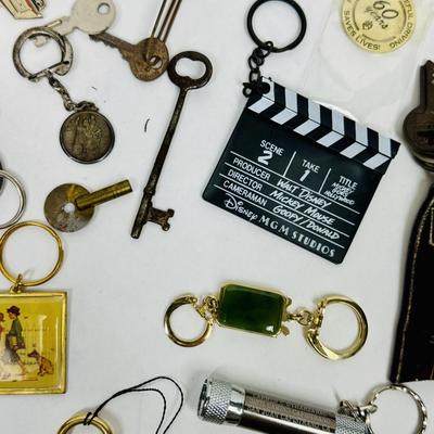 Sale Photo Thumbnail #157: Many different styles of keys and key fobs.  See photos for what's included.