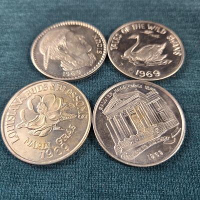 Sale Photo Thumbnail #50: This auction lot is for a Quad of 1969 Mardi Gras Tokens/Doubloons.  These are 4 large Mardi Gras Tokens in very good condition from 1969,  Aluminum doubloons were thrown from floats to the crowd and are considerate collectible by many. They are about 1.5