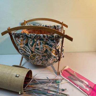 Knit away, MCM Bag and Needles. 