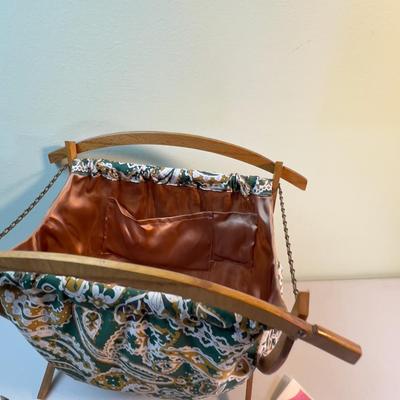 Knit away, MCM Bag and Needles. 