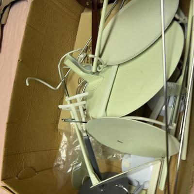 Pile of Doll Stands
