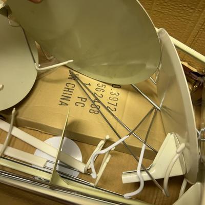 Pile of Doll Stands