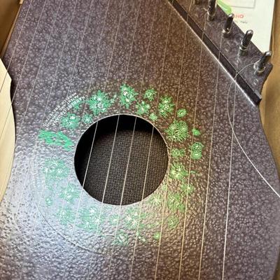 Lap Harp In the Box, with music. 