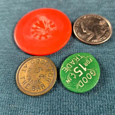 Sale Photo Thumbnail #54: This auction lot is for a Vintage Trio of Louisville Beer Tokens. There are two plastic beer tokens:  BPOE 8 and Bernie's Tim Tam Tavern.  The brass one is for JT's.  All are good for 1 beer.   A bit of Louisville memorabilia for you.  If anyone knows whe