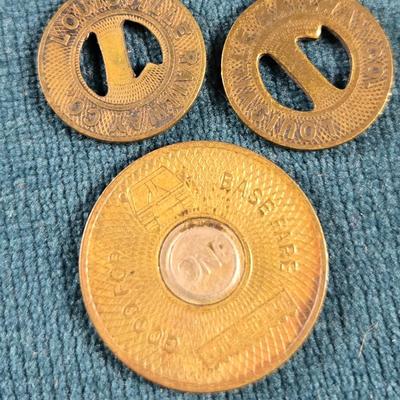 Sale Photo Thumbnail #59: This auction lot is for some Vintage Transit Tokens. The large one is from Los Angeles, CA and the other two are older styled tokens for Louisville, KY.  They are all metal - brass, used condition.  They are a neat collectible for sure.