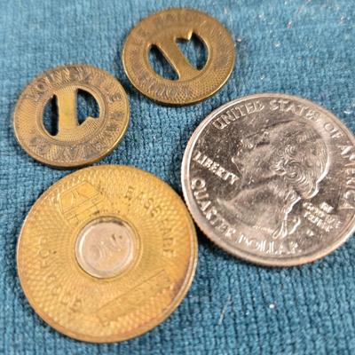 Sale Photo Thumbnail #60: This auction lot is for some Vintage Transit Tokens. The large one is from Los Angeles, CA and the other two are older styled tokens for Louisville, KY.  They are all metal - brass, used condition.  They are a neat collectible for sure.