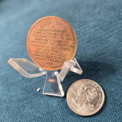 Sale Photo Thumbnail #72: This auction lot is for a Boy Scout Oath Challenge Coin. This is a vintage Boy Scout Oath Coin.  It is a large brass coin that is about 1.5-inches in diameter.  It is in good used condition.  This is a great scouting collectible.