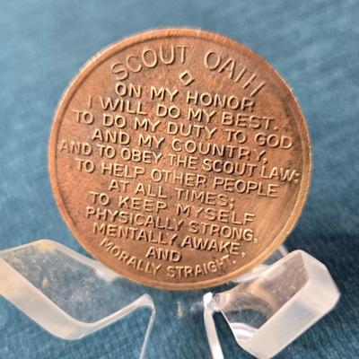 Sale Photo Thumbnail #71: This auction lot is for a Boy Scout Oath Challenge Coin. This is a vintage Boy Scout Oath Coin.  It is a large brass coin that is about 1.5-inches in diameter.  It is in good used condition.  This is a great scouting collectible.