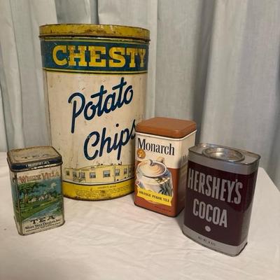 Sale Photo Thumbnail #98: Vintage food tins from chest potato chips, monarch tea, white villa, tea, and Hershey's cocoa.