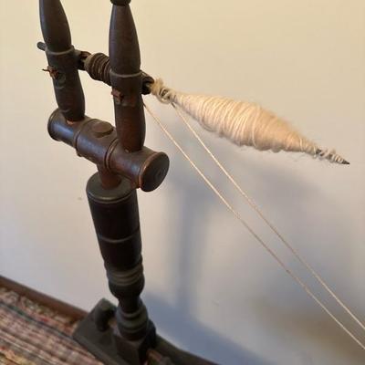Sale Photo Thumbnail #106: Beautiful vintage spinning wheel in good shape. The wheel is 40 inches in diameter. All spikes in and good shape
The length of the spinning wheel is approximately 65 inches .