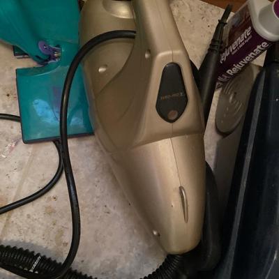 Hoover steam vac and cleaning supplies